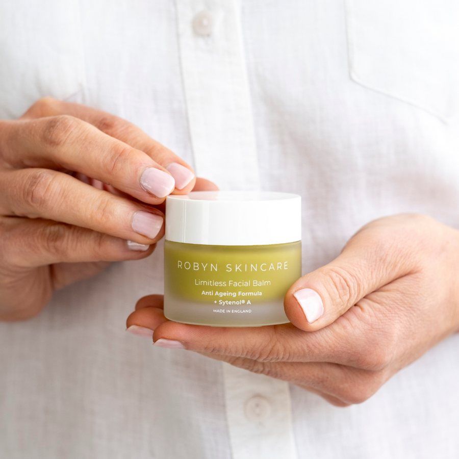 Vegan Bakuchiol night balm held in hand – cruelty-free skincare made in UK