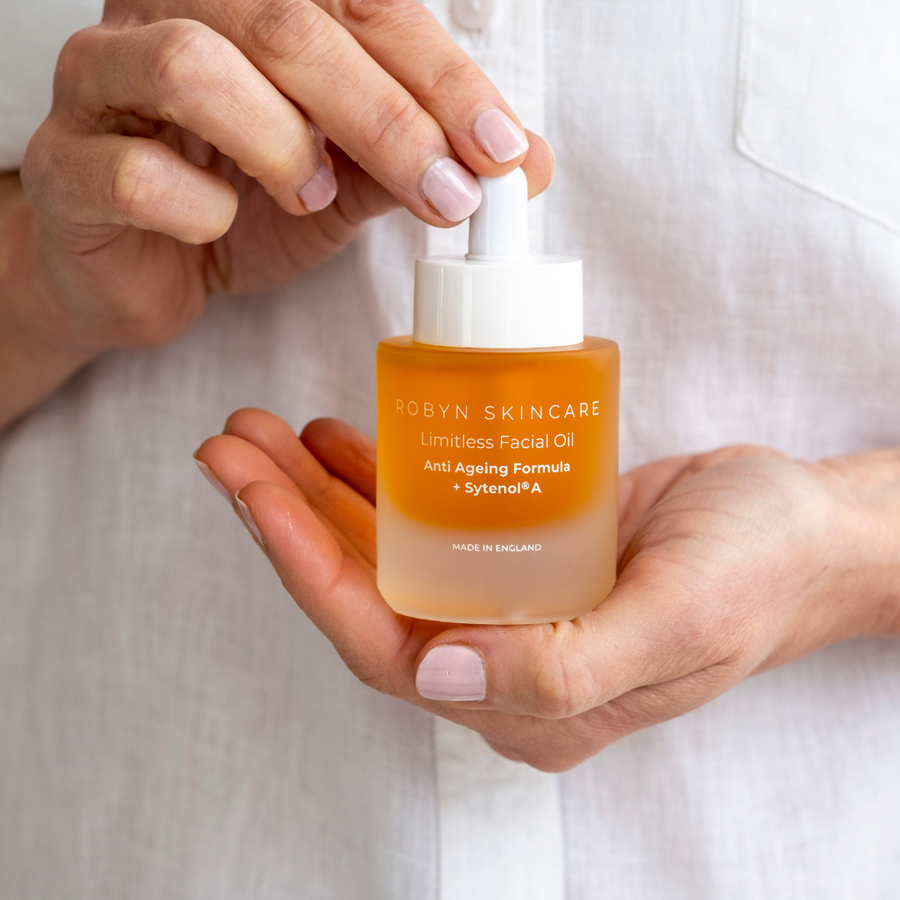 Person holding Advanced Antioxidant Regenerative Facial Oil in hands – luxury natural skincare for all skin types from Robyn Skincare